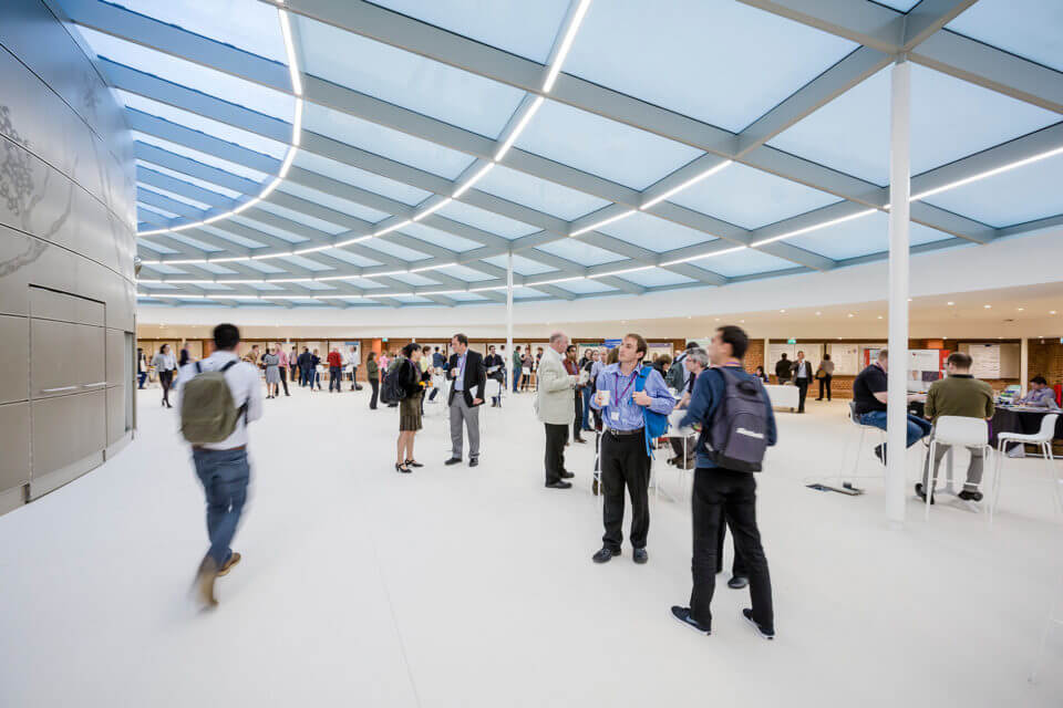 Conference delegates in the Conference Centre exhibition space