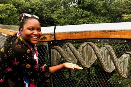 Tapoka, hanging out with the DNA plaque at Royal Kew Botanic Gardens